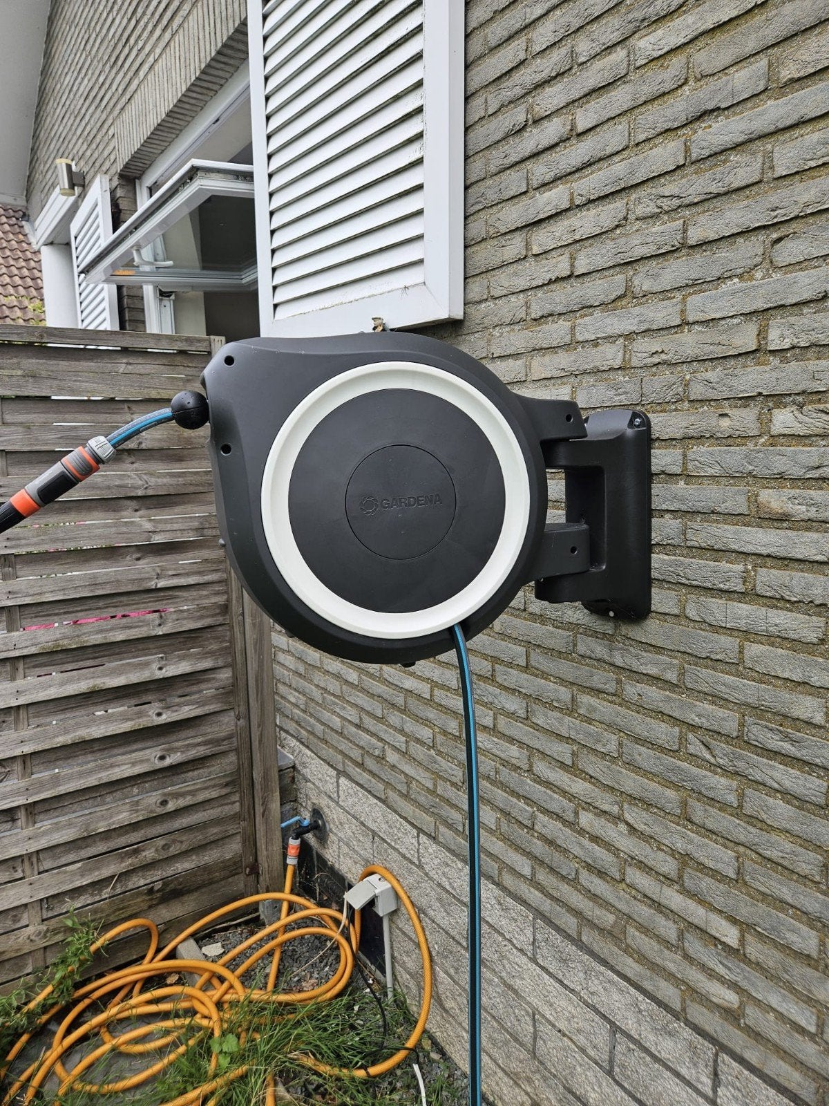 Dispenser voor tuinslangen, Ophalen, Tuinslanghaspel
