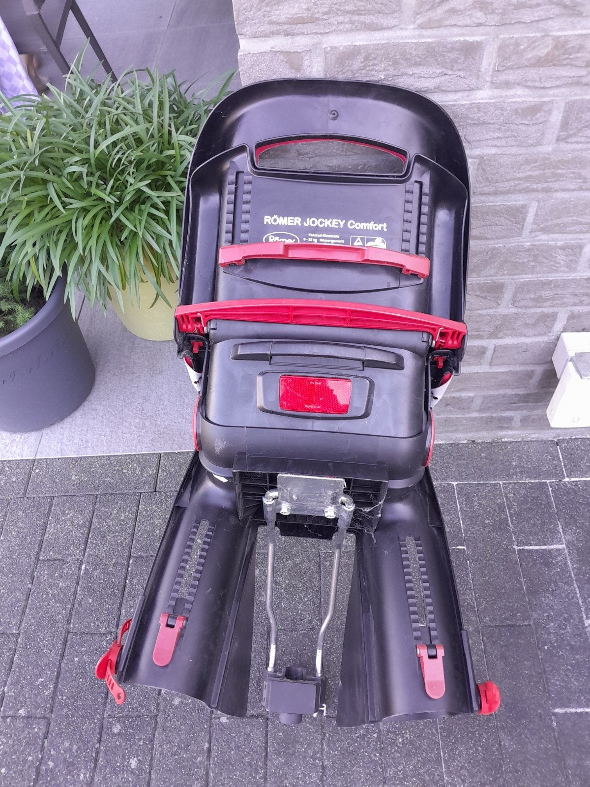 Kinderstoel voor fietsen, Ophalen