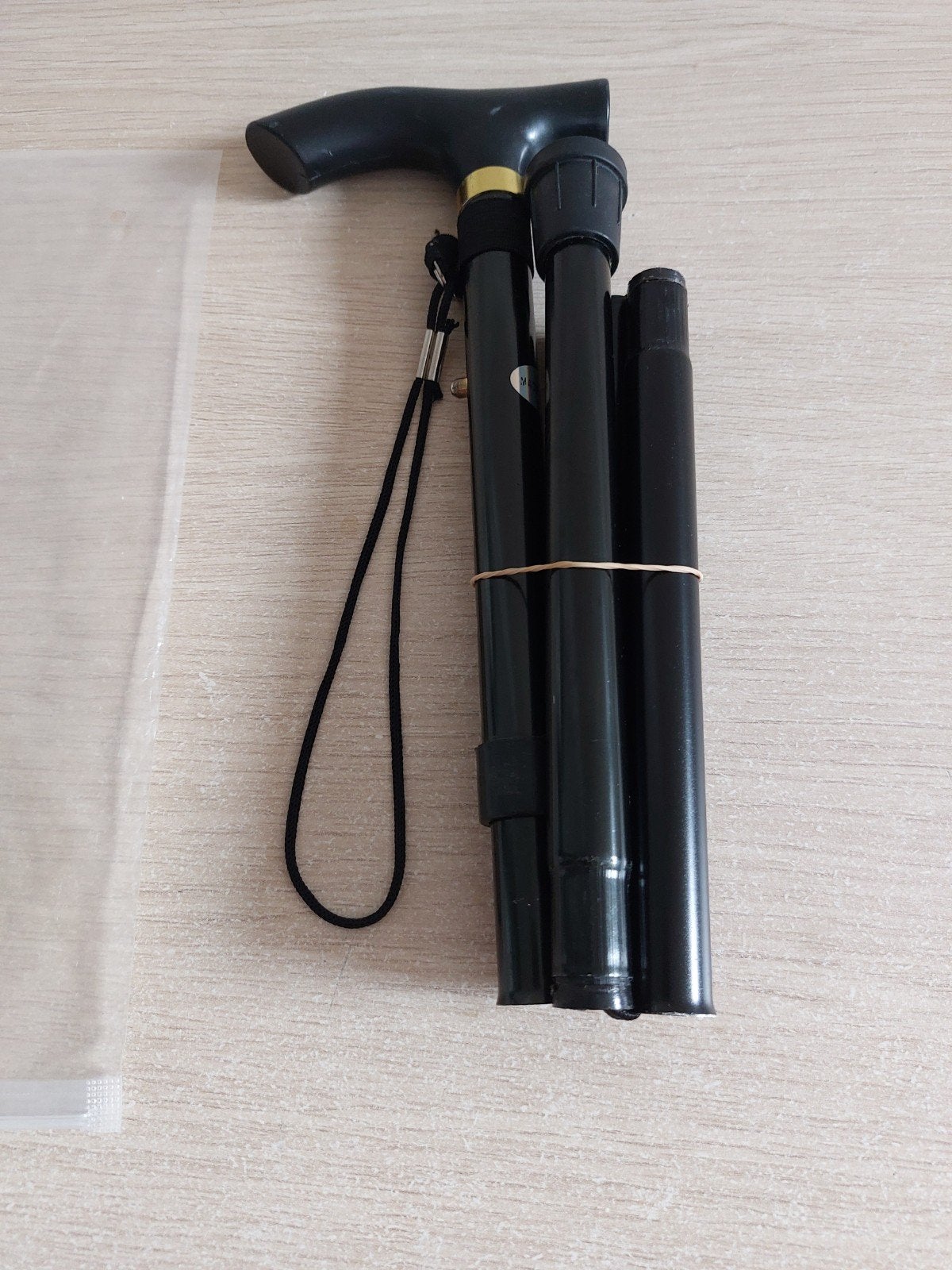 Canne de marche réglable et pliable, Enlèvement
