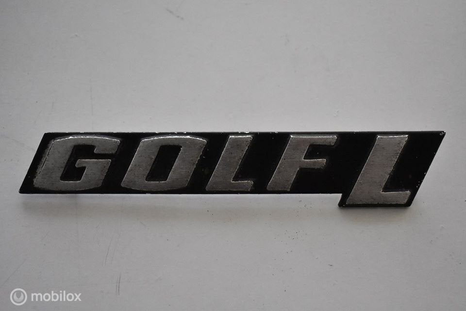 Aluminium "Golf L" embleem Swallowtail 1974 1975 1976, Auto-onderdelen, Gebruikt, Volkswagen, Ophalen of Verzenden