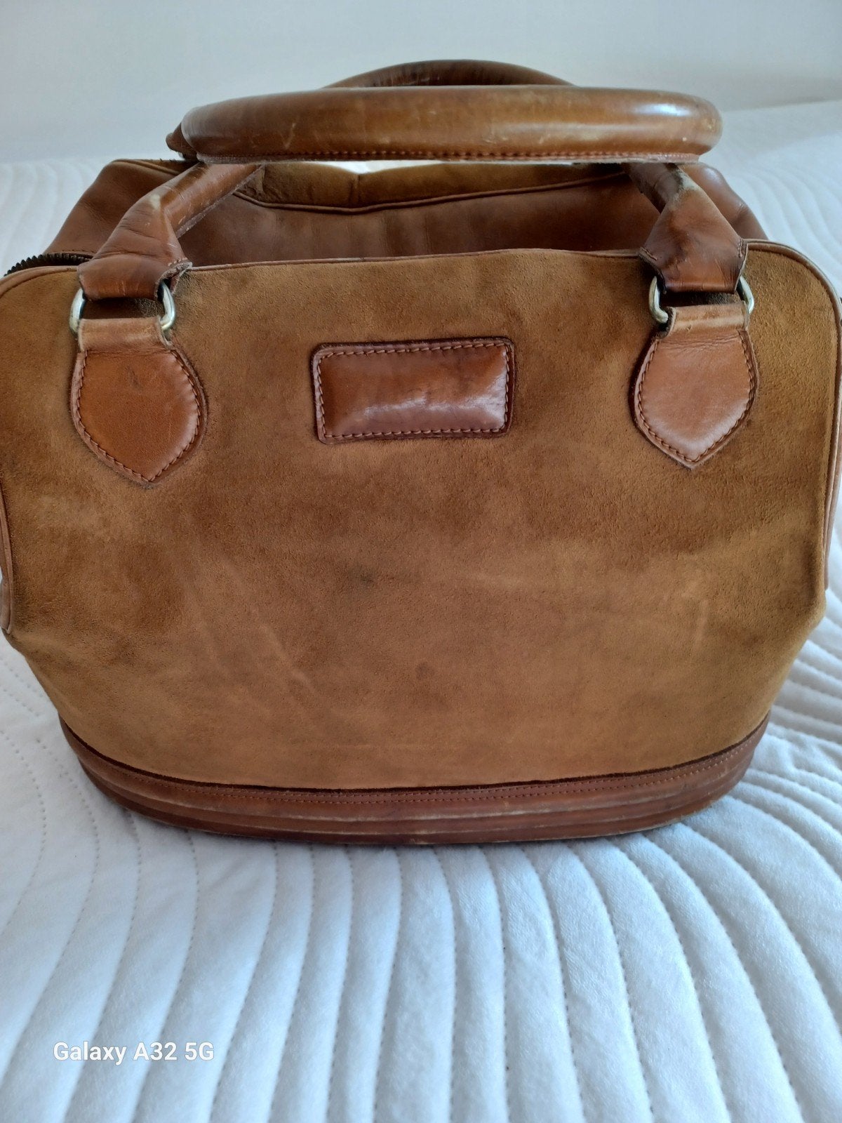 DELVAUX Sac fauve vintage siglé, Envoi
