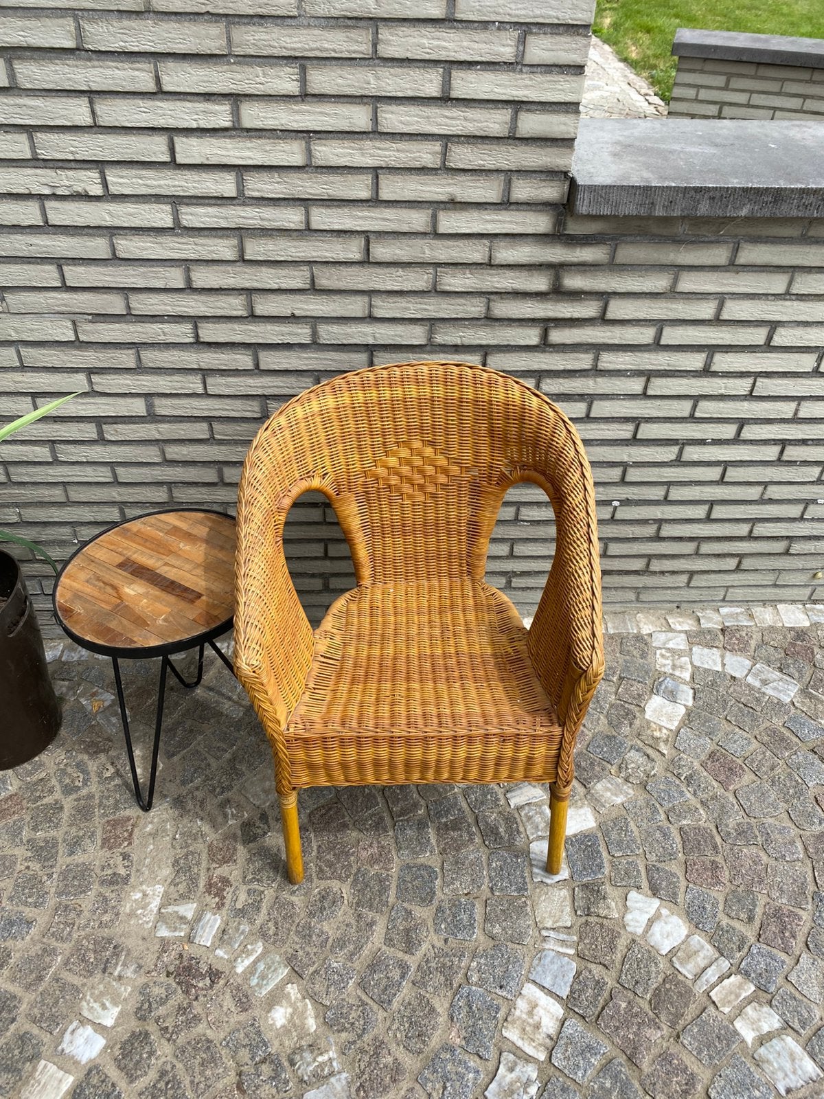 Rotan fauteuil / vlechtstoel, Tuin en Terras, Tuinstoelen, Zo goed als nieuw, Ophalen