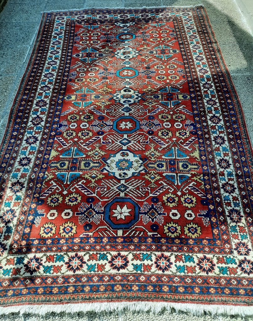 Handgeknoopte oude tapijt ( shirwan ), Ophalen
