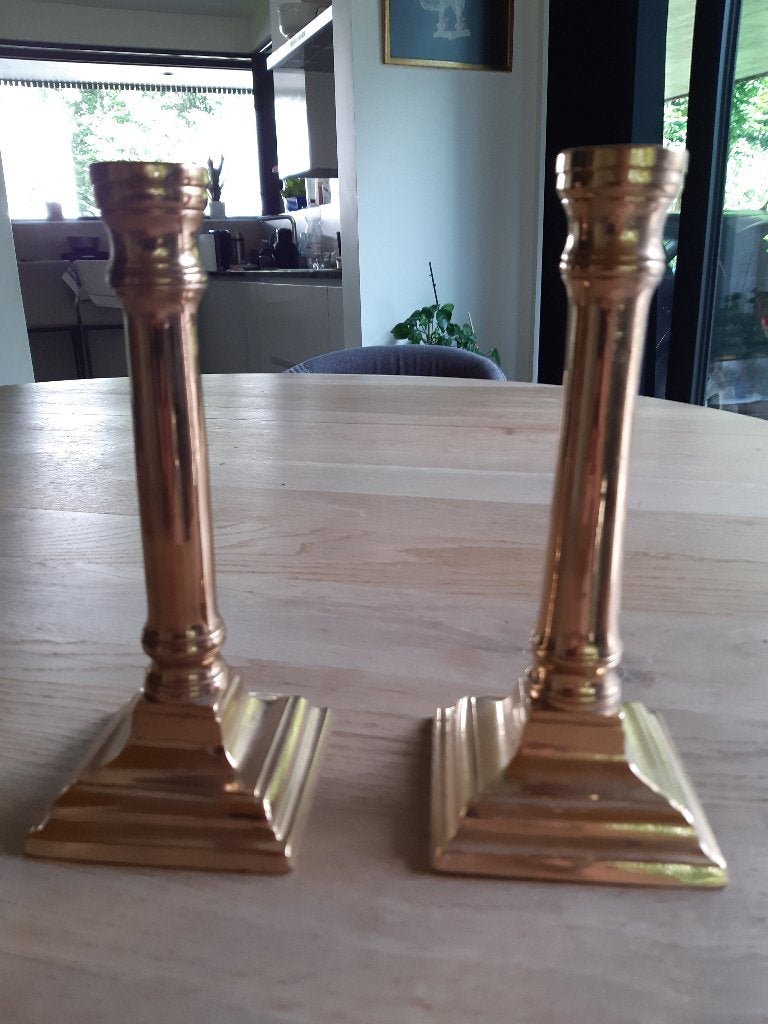 koperen kandelaars, Ophalen