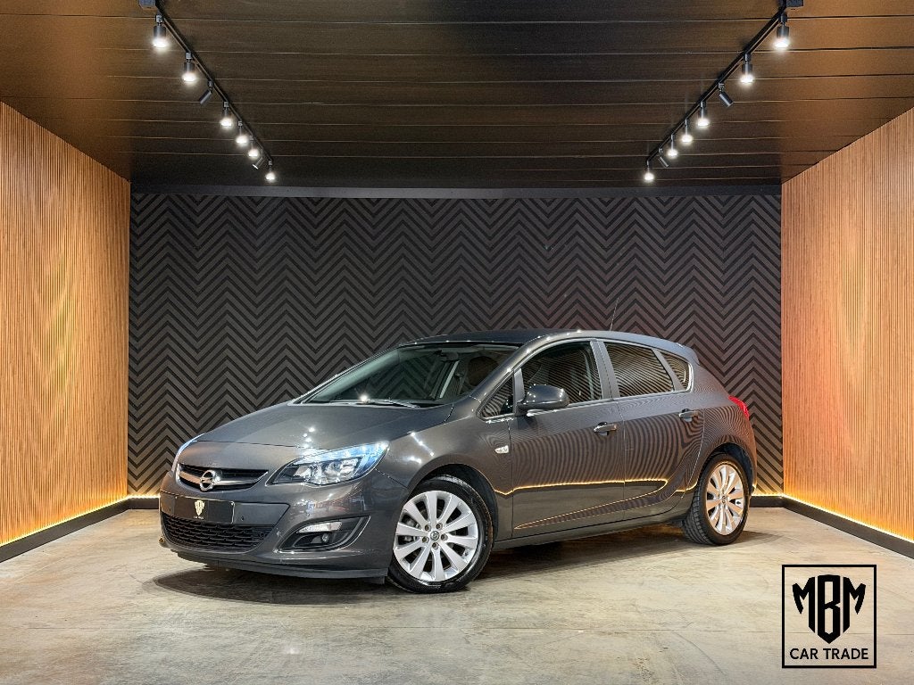 ✅ Opel Astra 1.6i GARANTIE Airco Cruise C Parksensoren V+A, Voorwielaandrijving, Euro 5, Stof, Zwart