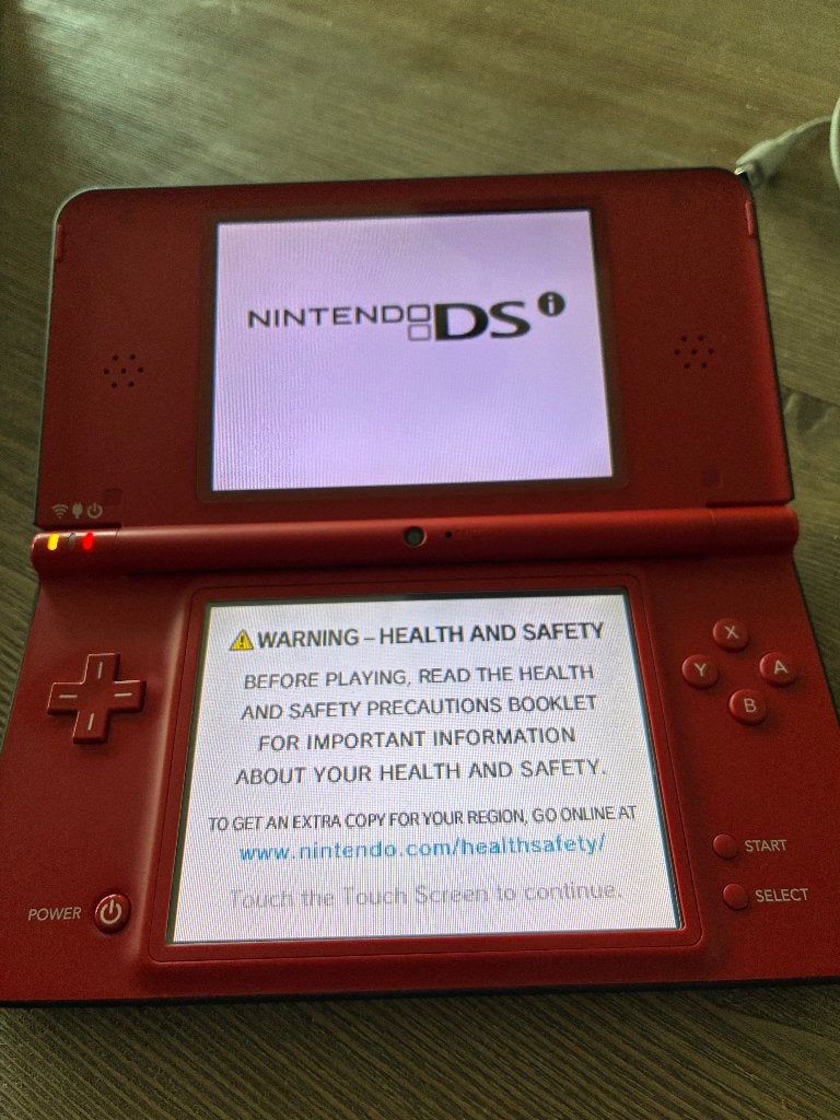 Nintendo DSi XL Mario 25th Anniversary, Dsi XL, Ophalen of Verzenden, Zo goed als nieuw, Rood