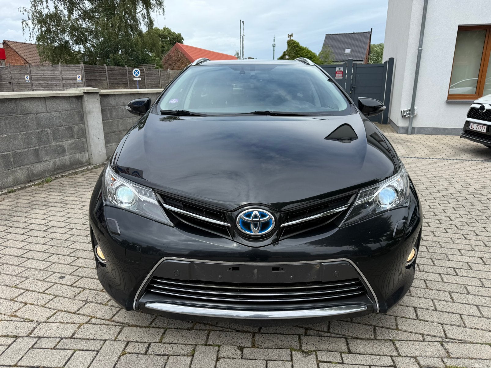 Toyota Auris 1.8 HYBRIDE voll voll. JBL, Zwart, 4 cilinders, Leder en Stof, Zwart