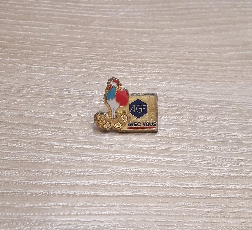 PIN - AGF - OLYMPISCHE SPELEN - JEUX OLYMPIQUES - HAAN - COQ, Envoi, Utilisé, Sport, Insigne ou Pin's