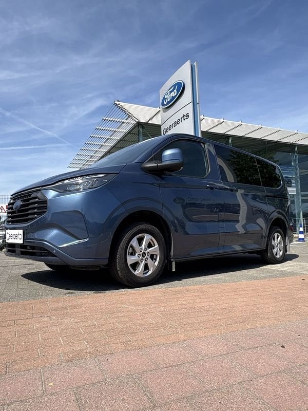 Ford Transit Custom KOMBI 340L LIMITED 2.5T 227pk FWD, Auto's, Ford, Stof, Gebruikt, Zwart, Blauw