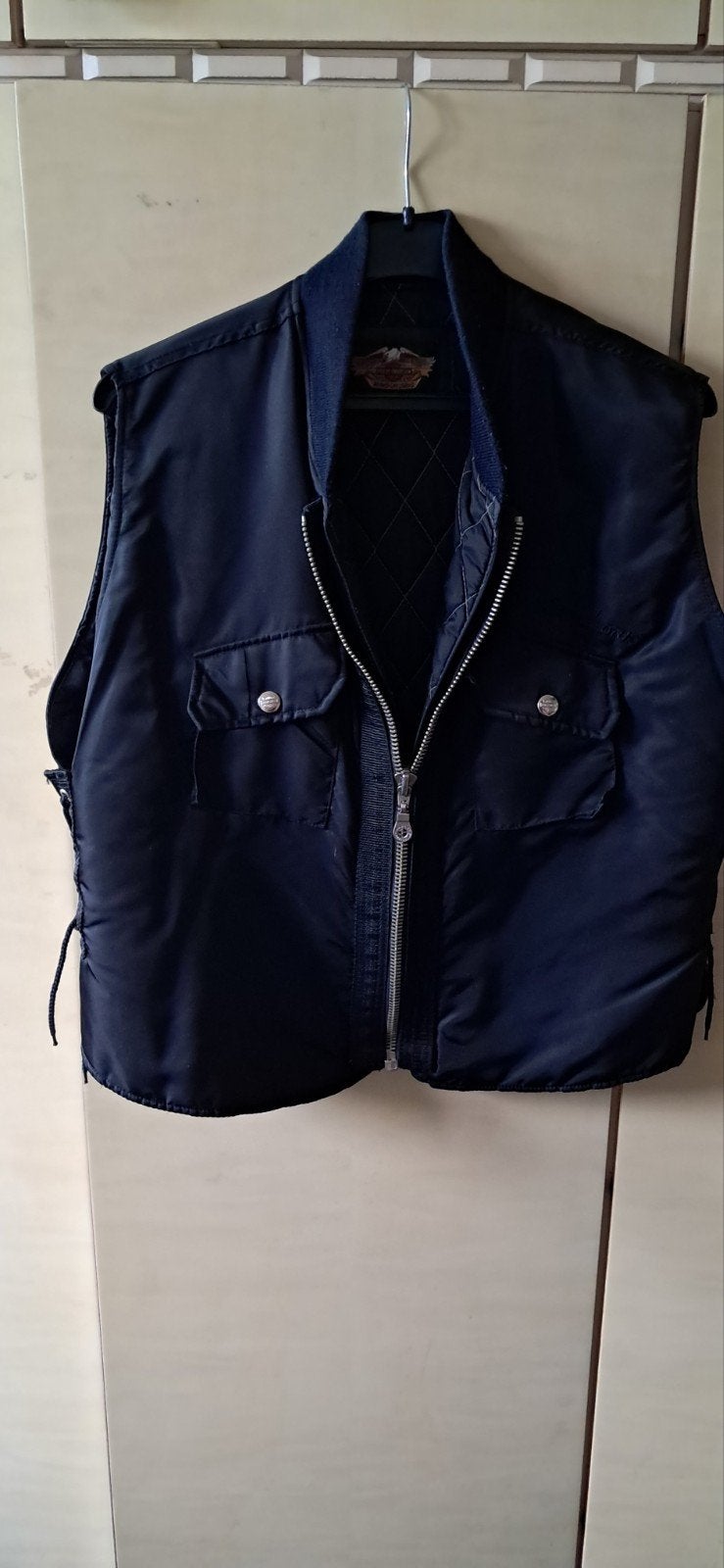 Mouwloos jack van Harley Davidson, Ophalen