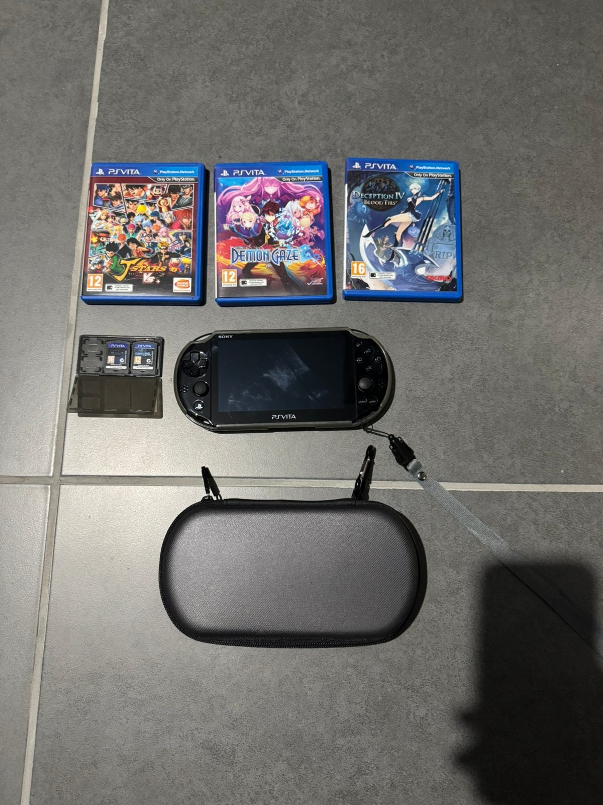 Sony PS Vita OLED Bundel + Beschermhoes, Case & 3 Games, Games en Spelcomputers, Games | Sony PlayStation Vita, Ophalen, Zo goed als nieuw
