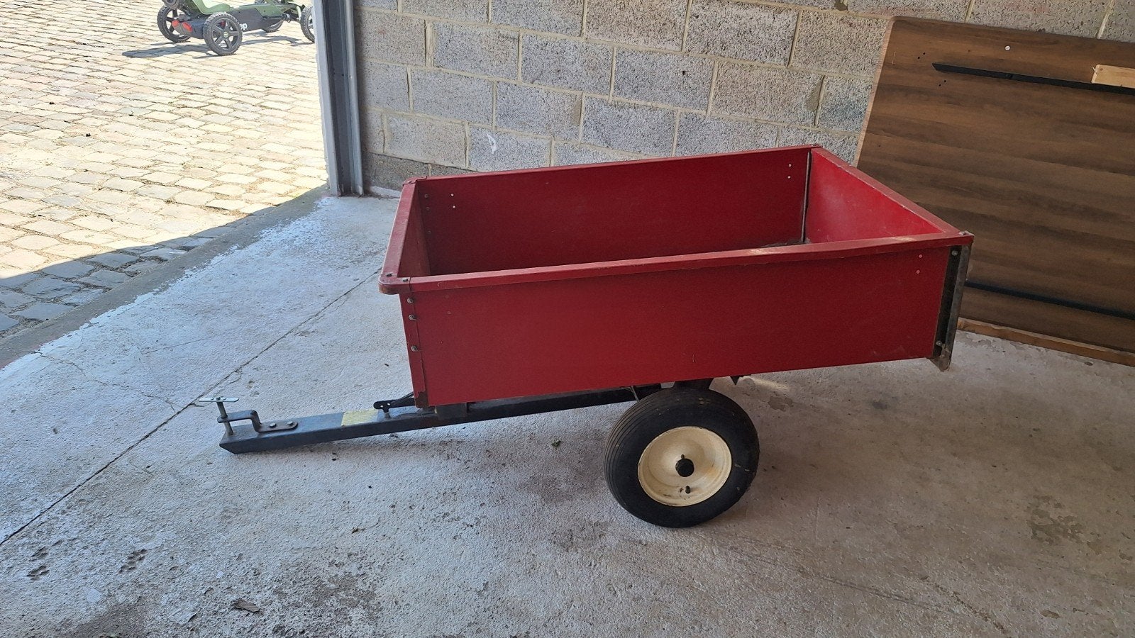 Aanhangwagen voor zitmaaier, Ophalen