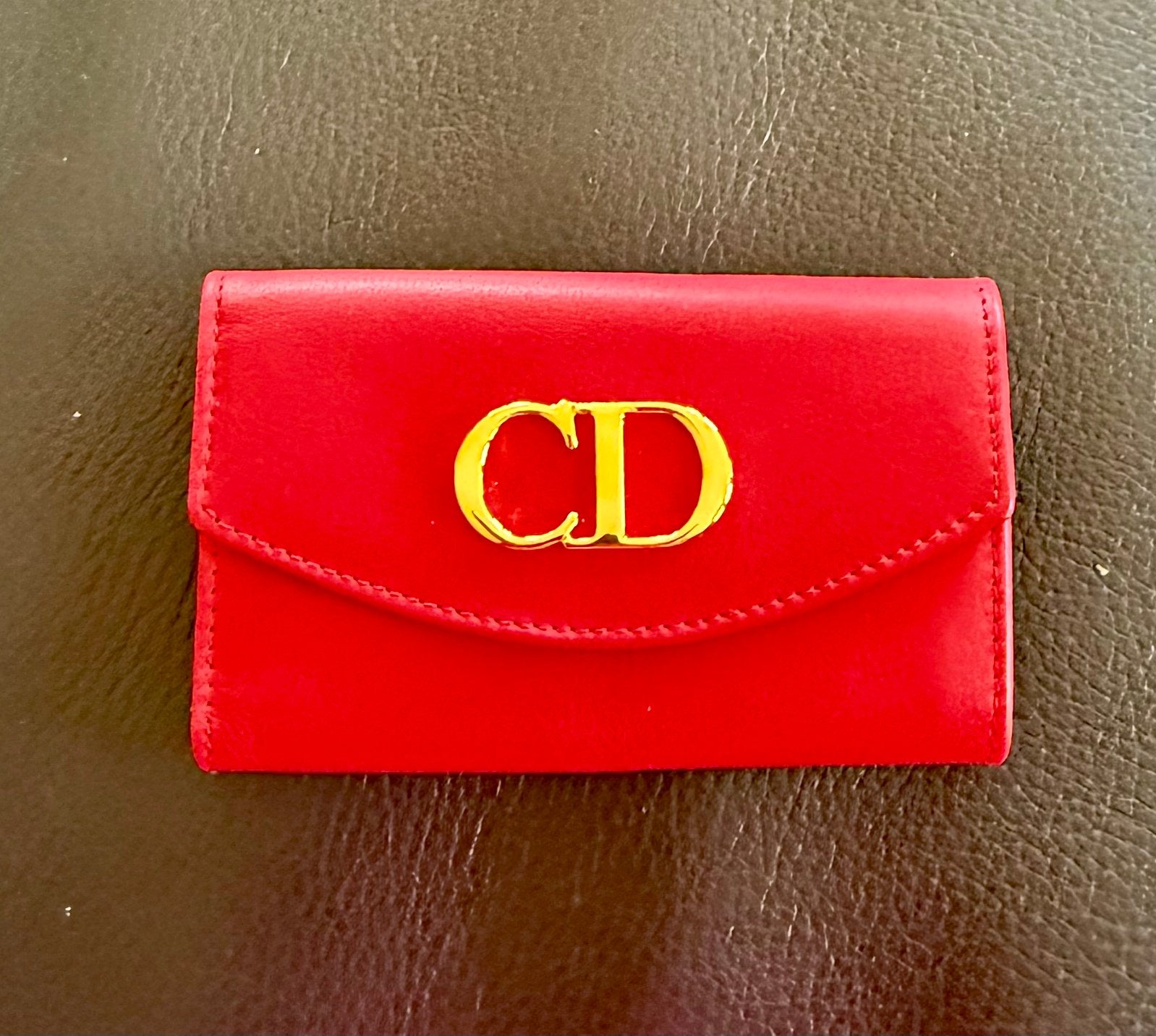 Nooit gebruikte Christian Dior vulset vintage sleutelhanger, Ophalen of Verzenden, Zo goed als nieuw, Rood, Leder