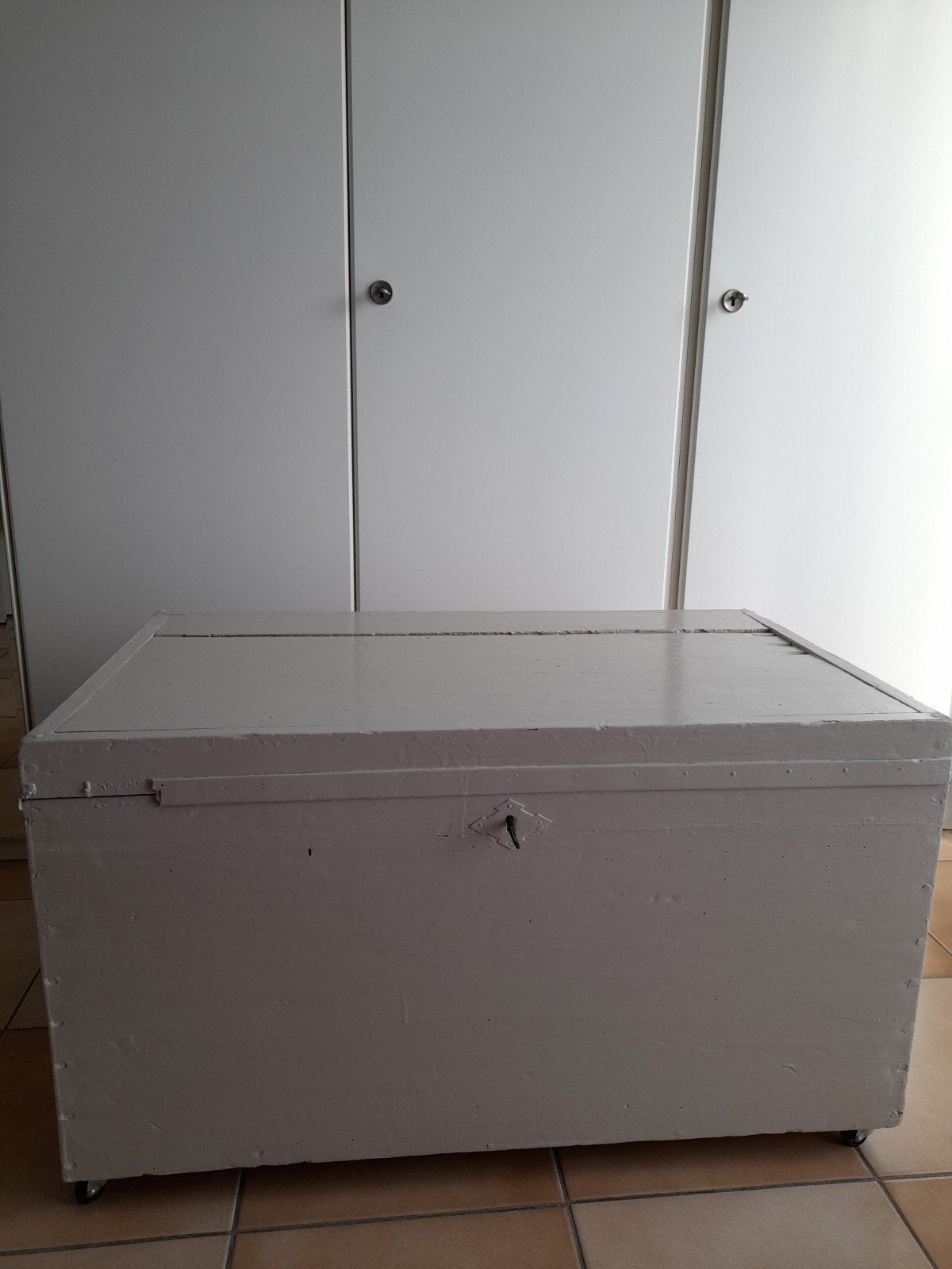 houten kist op wieltjes, Ophalen