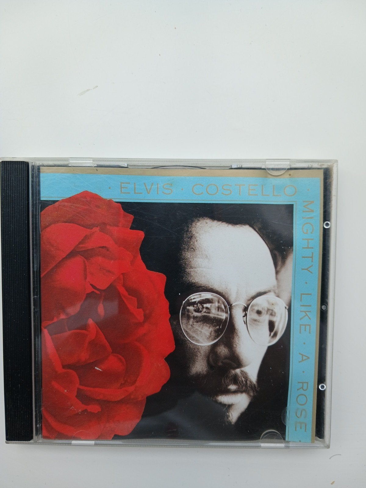 Elvis costello mighty like a rose cd, Ophalen of Verzenden, Gebruikt