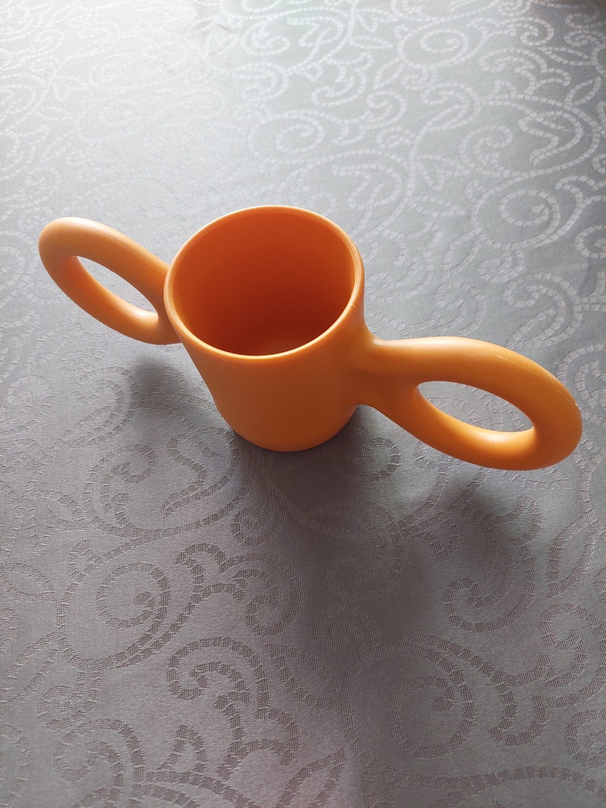 Oranje Gispen Dombo drinkbeker of Domoor van Richard Hutten, Enlèvement ou Envoi, Comme neuf, Gobelet, Autres marques