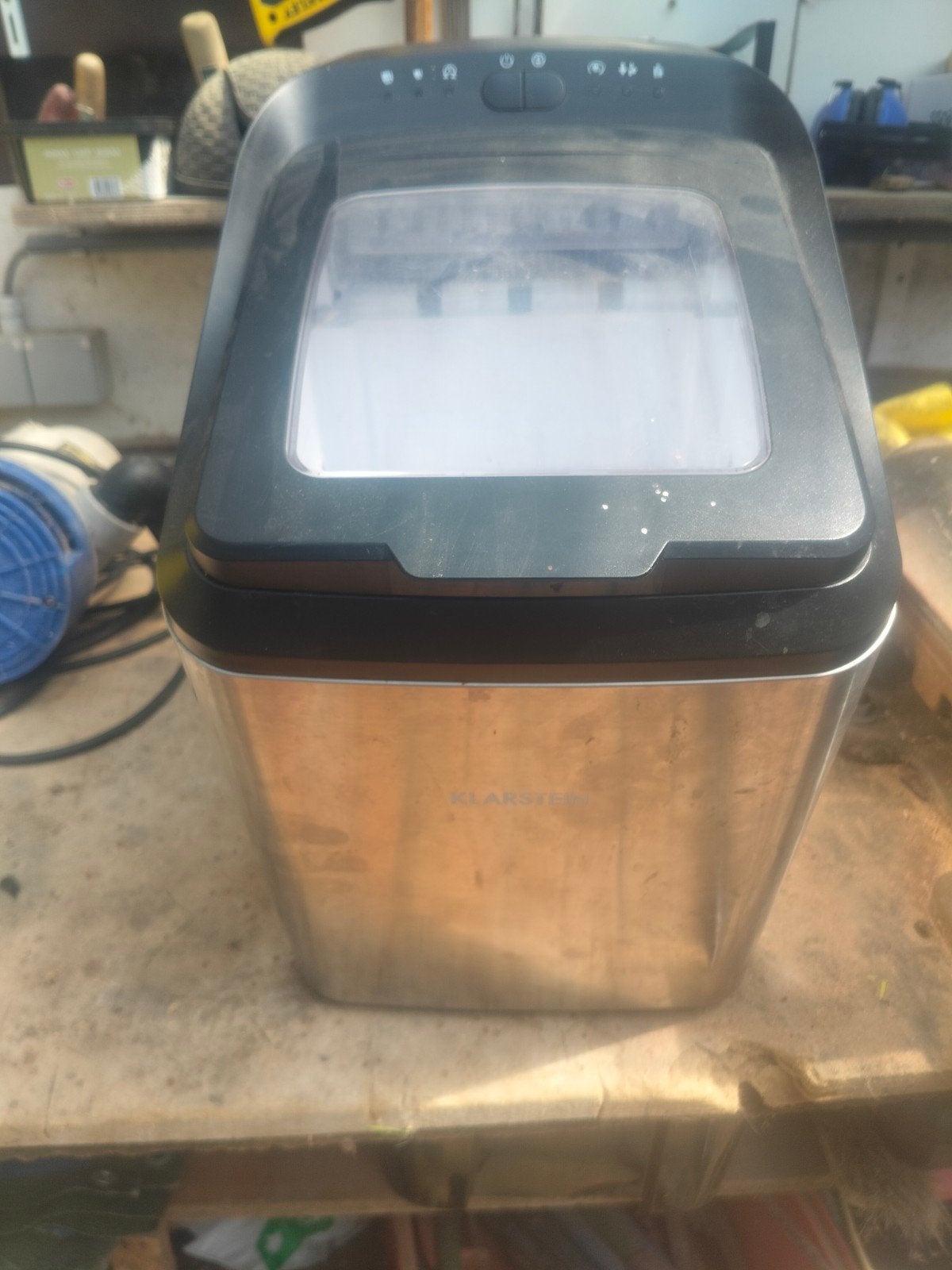 ice cube maker, Ophalen
