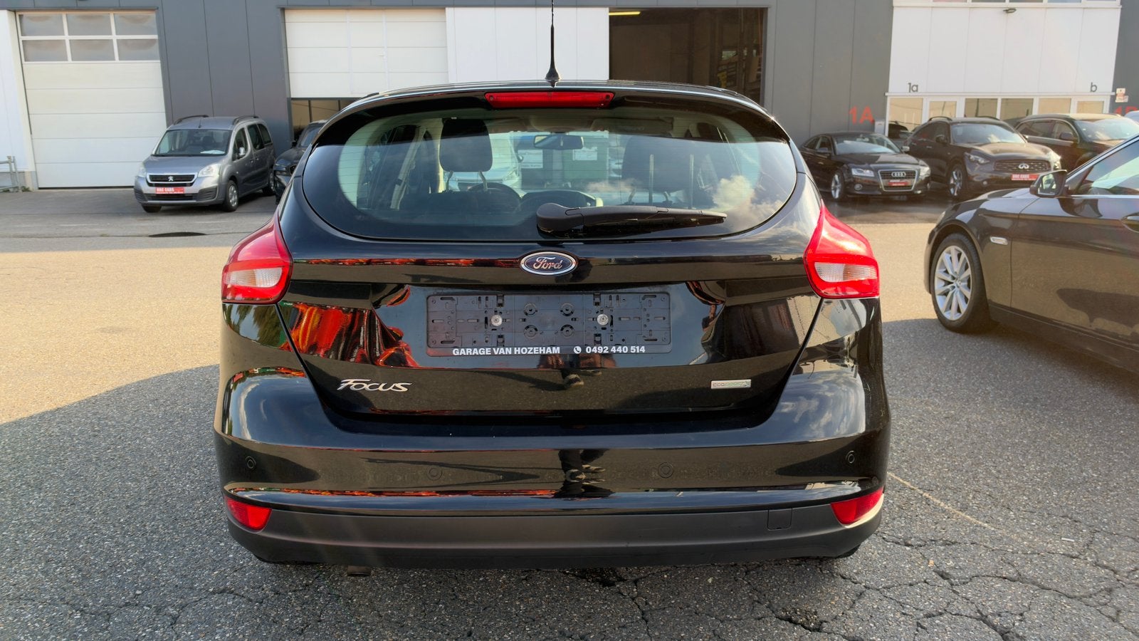 FORD FOCUS 1.0 EcoBoost 125 pk EERSTE EIGENAAR – 12M  GARANT, Auto's, Focus, Stof, Zwart, 3 cilinders