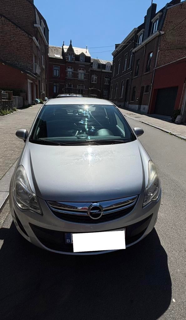 Voiture Opel Corsa, Autos, Opel, Particulier, Corsa, Diesel, Euro 5, Autre carrosserie, 5 portes, Argent ou Gris, Noir, Tissu