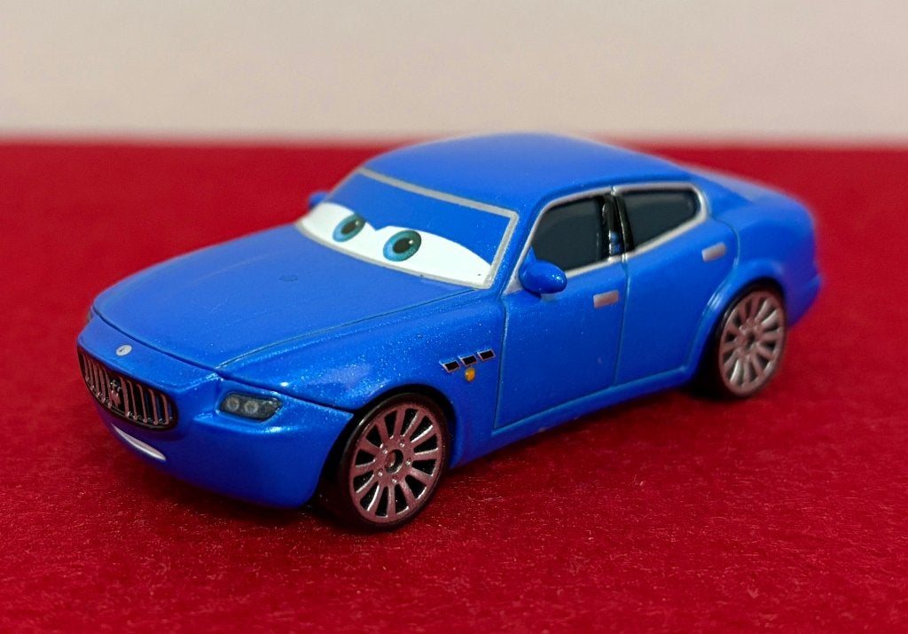 DISNEY CARS Bindo Maserati DieCast 1:55, Enlèvement ou Envoi, Neuf, Voiture