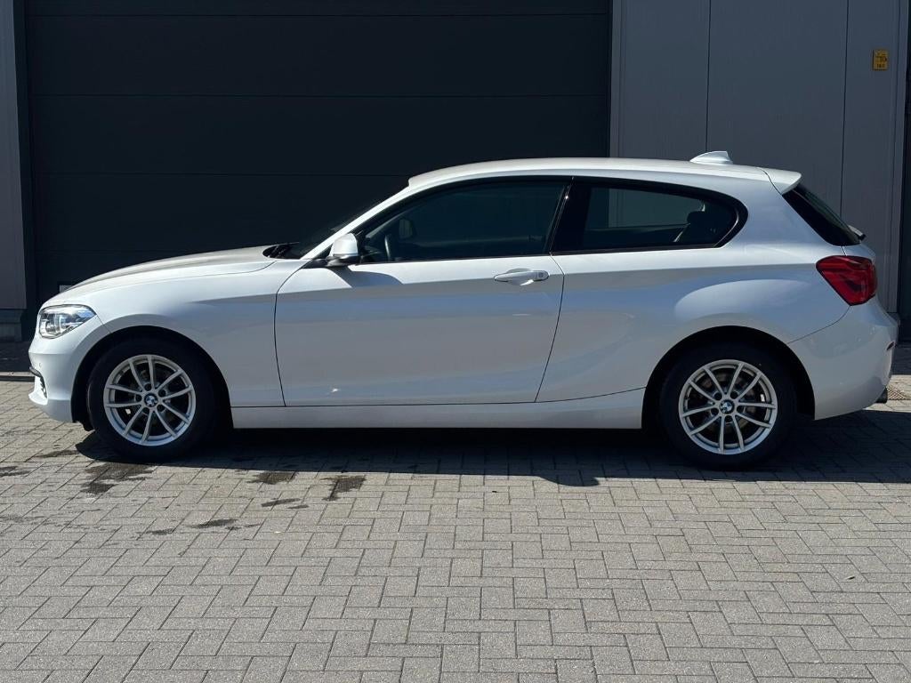 BMW 118I benzine automaat, Auto's, BMW, Wit, Bedrijf, 5 zetels, 3 cilinders