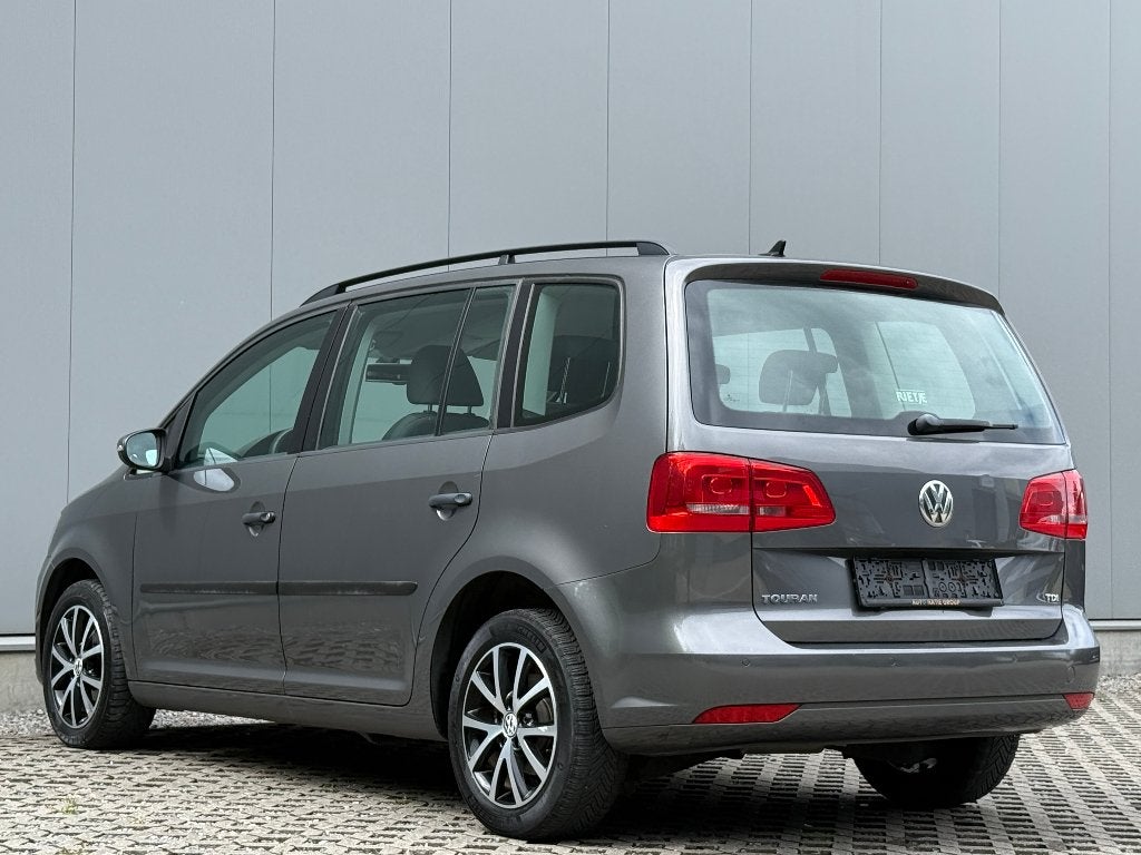 Volkswagen Touran 1.6 TDi DSG 5-Zit Cruise ParkSensor Navi, Euro 5, 4 cilinders, https://public.car-pass.be/vhr/adab7903-5ffa-4908-8a97-eaa36eb2c4c2