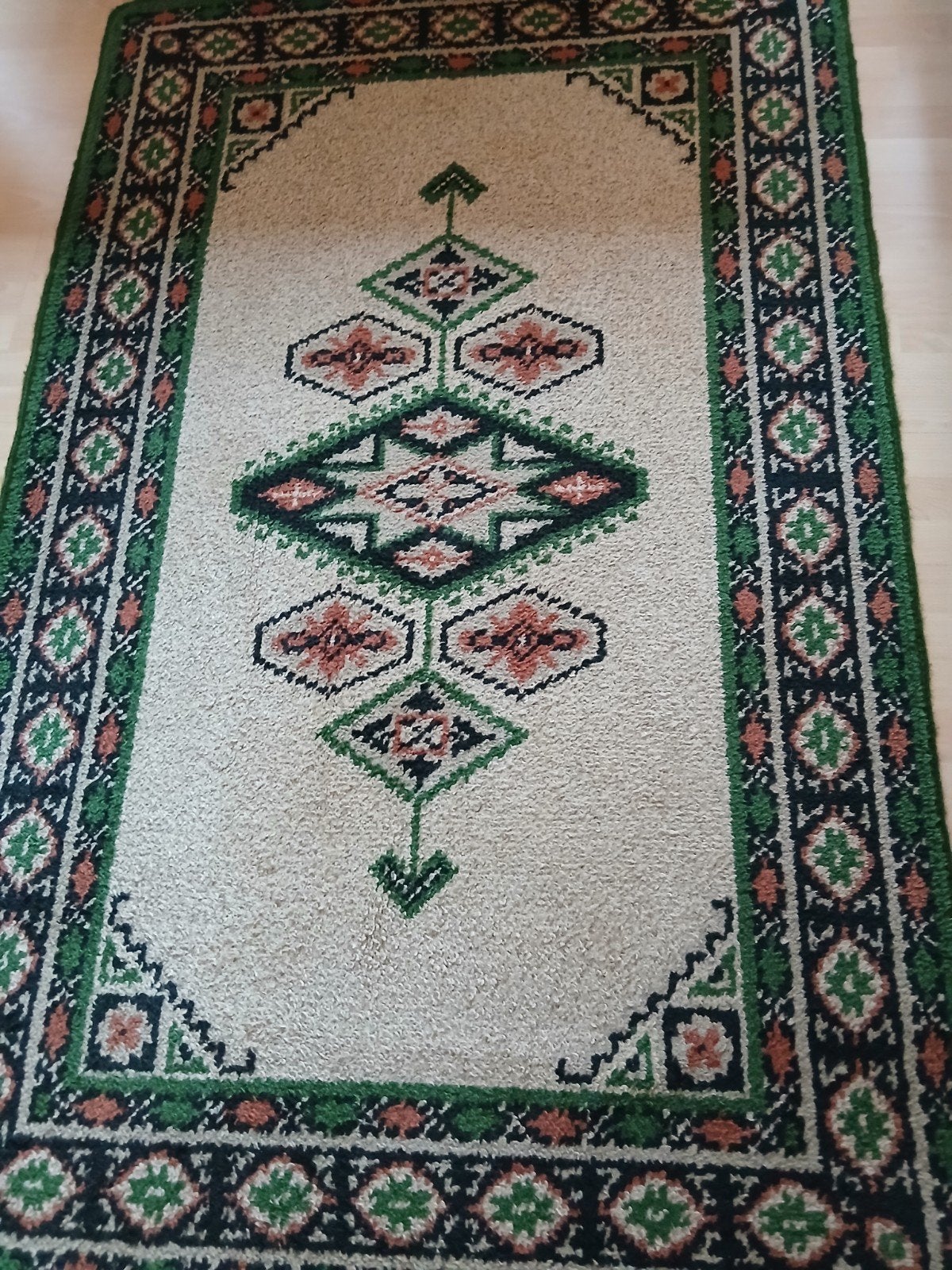 Smijrna tapijt in wol, Ophalen