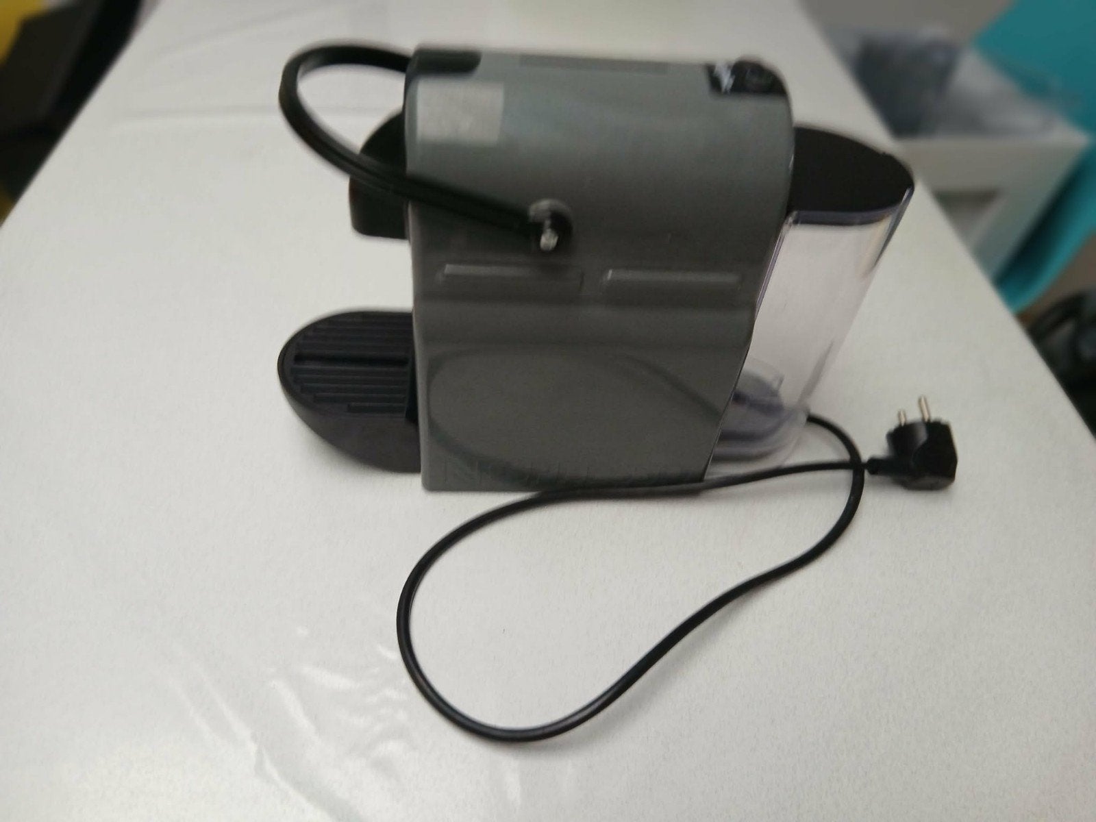 Maschine Nescafe grise, Enlèvement