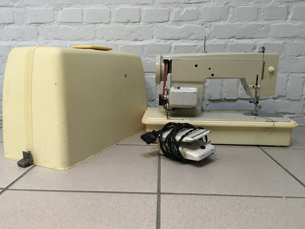 Naaimachine, Ophalen
