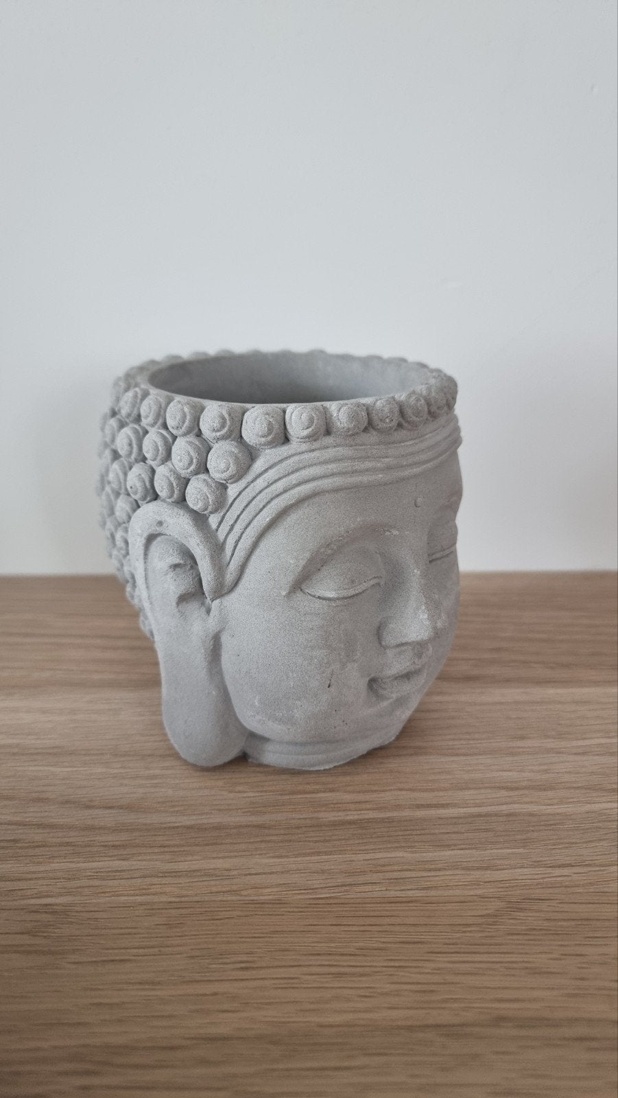 Pot de fleurs Bouddha, Enlèvement