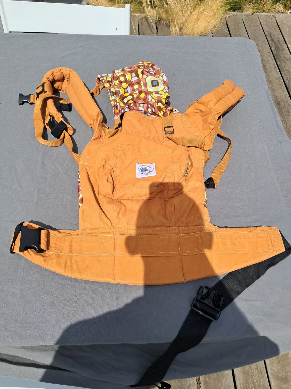 Oranje draagzak, Enlèvement, Porte-bébé