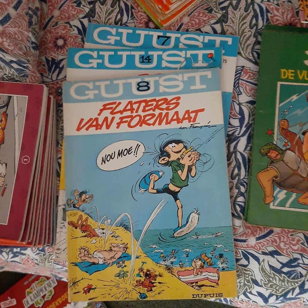 Guust Flater., Ophalen