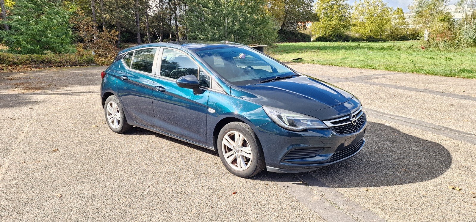 Opel Astra 1.0 Turbo Benzine Euro 6 2016, Auto's, Voorwielaandrijving, Stof, Euro 6, Bedrijf