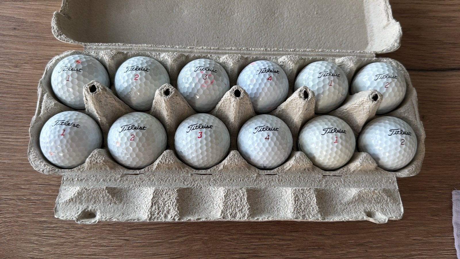 12 balles de golf Titleist – Bon état, Ophalen of Verzenden, Bal(len)