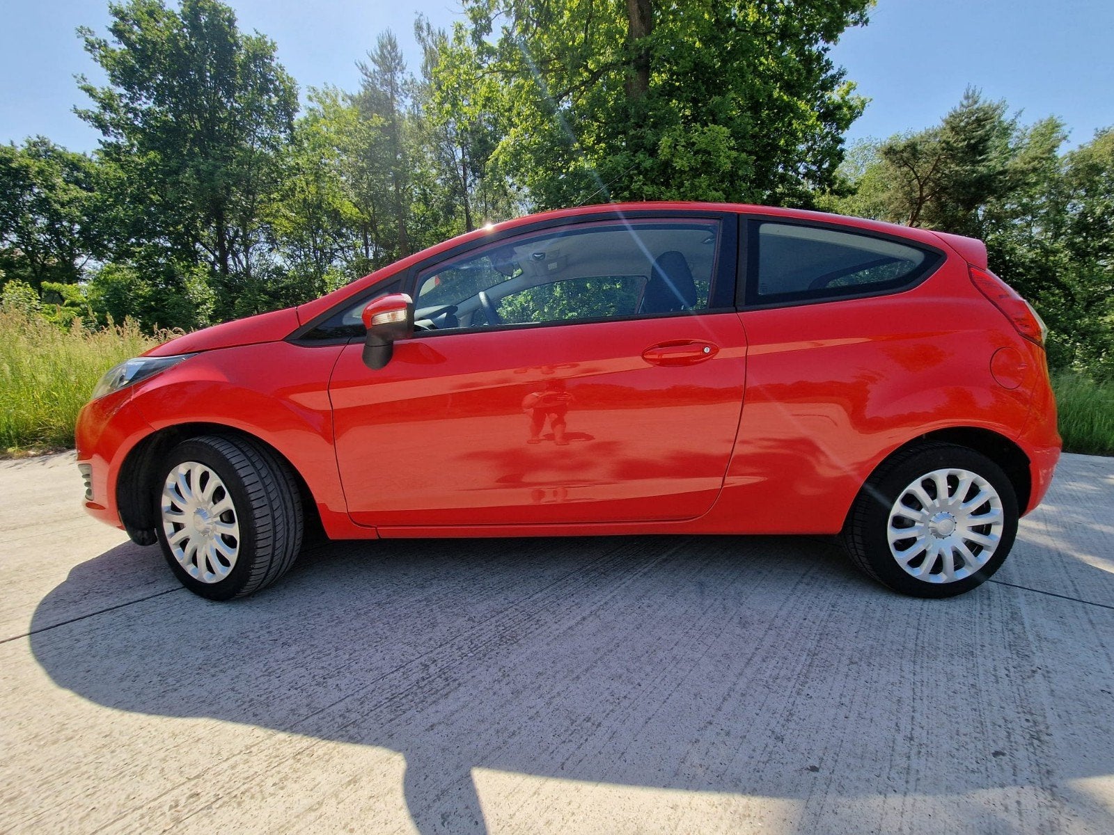 Ford Fiesta 1.25i '13 12m garantie!, Auto's, Voorwielaandrijving, Euro 5, Stof, Zwart
