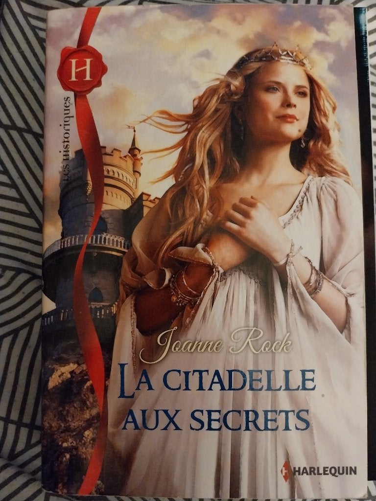 La citadelle aux secrets, Enlèvement, Comme neuf, Joanne Rock