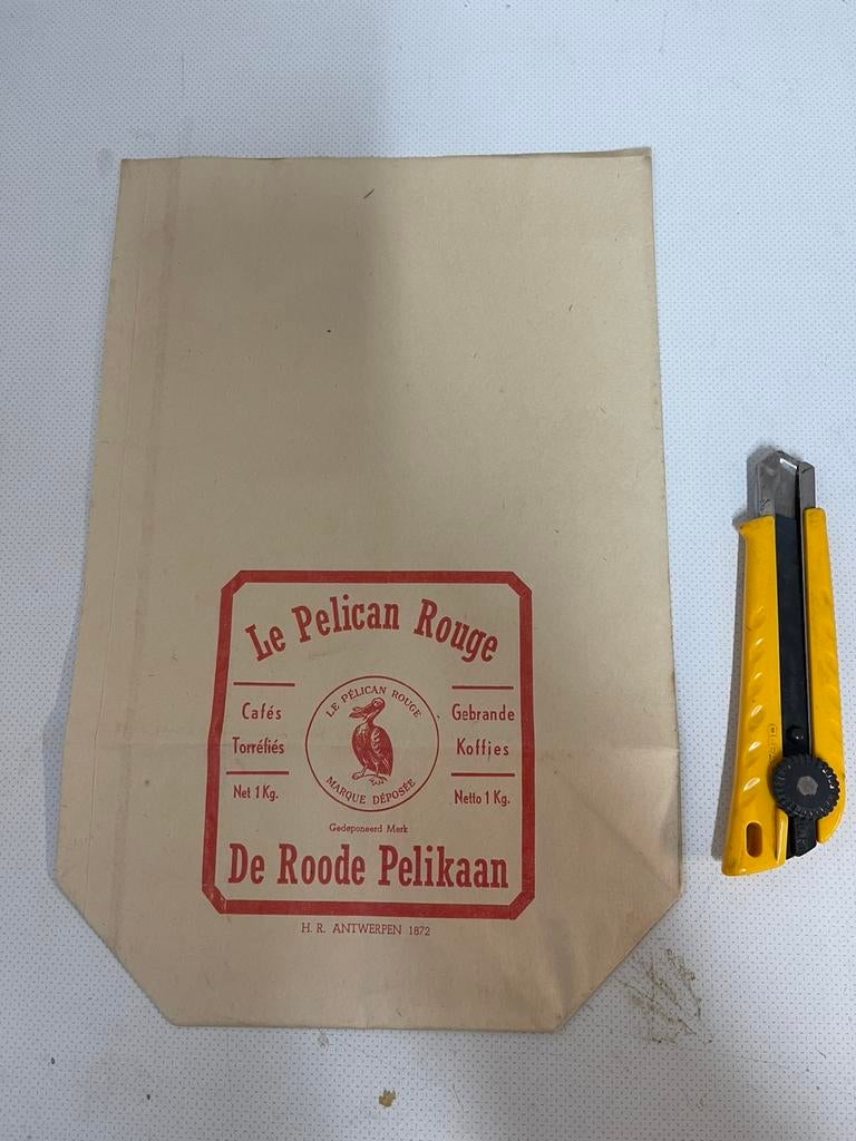 Le pelican rouge papier zak, Enlèvement ou Envoi, Comme neuf