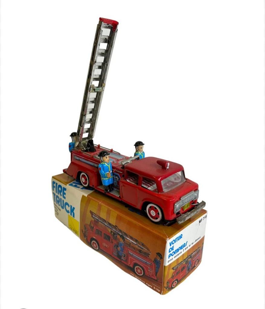 Blikken brandweer ladderwagen met sirene, Ophalen