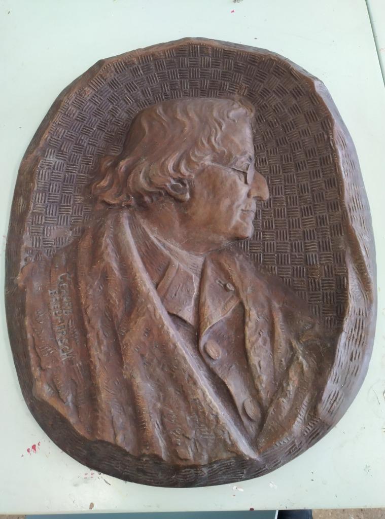 reliefs van Gezelle en Verriest door Breemersch, Ophalen