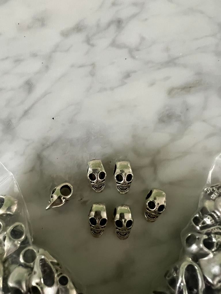 Doodskoppen zilver meer dan 100 stuks, Ophalen of Verzenden, Nieuw, Bedel