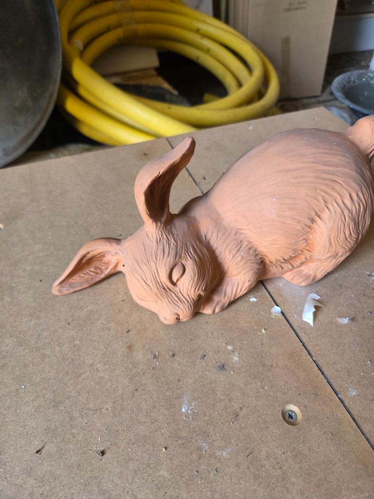 Terracotta beeld konijn, Ophalen