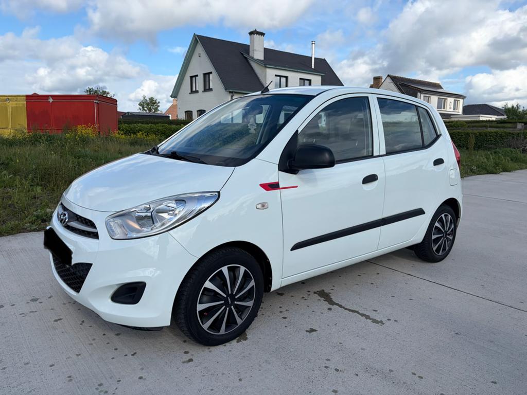 Hyundai i10 1.1 Benzien 2011 GEKEURD VOOR VERKOOP, Auto's, Voorwielaandrijving, Euro 5, Stof, Wit