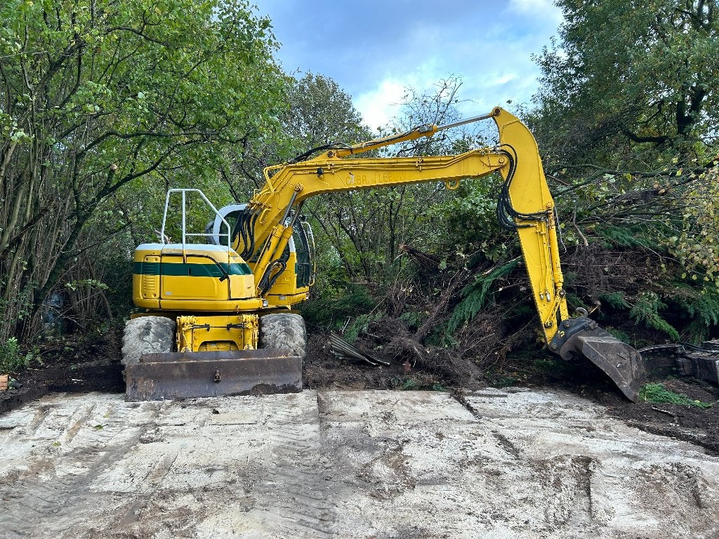 Bandenkraan New holland 135 kobelco sk135, Enlèvement, Excavatrice