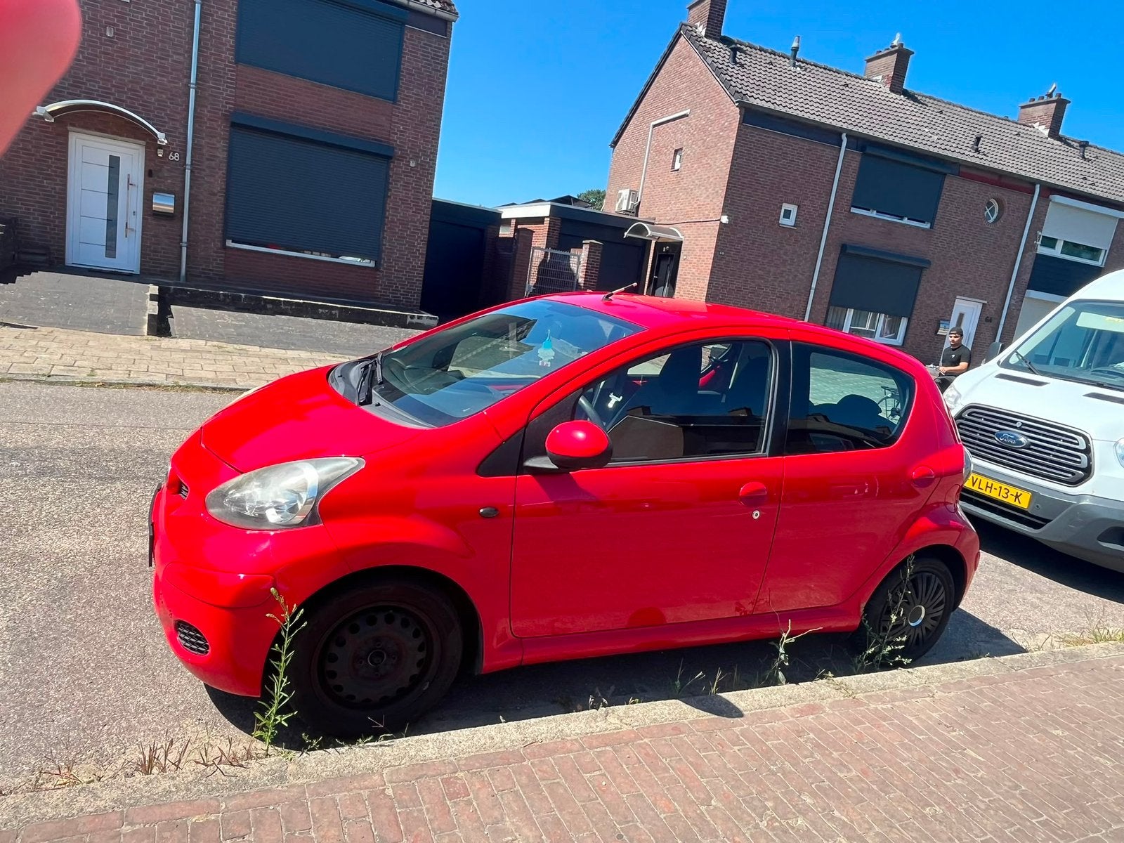 Toyota Aygo 2009, Auto's, Toyota, Euro 5, 5 deurs, Aygo, Rood