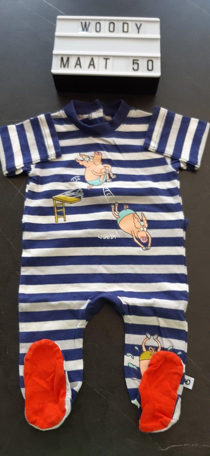 Woody pyjama's, Ophalen