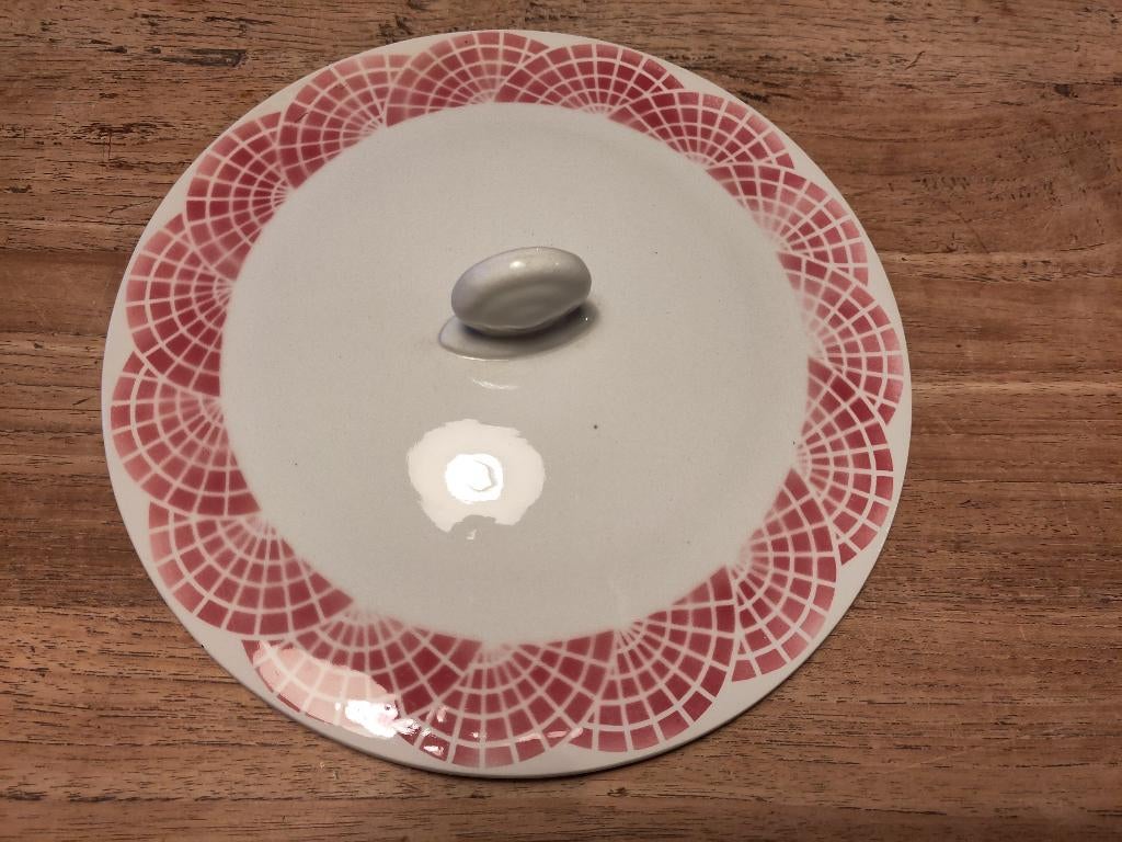 Deksel wit met roze patroon, Enlèvement