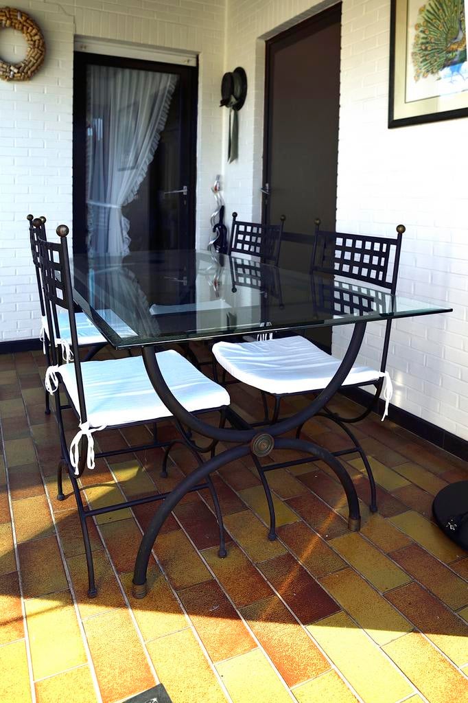 Smeedijzeren tafel met glazen blad, Huis en Inrichting, Ophalen, Gebruikt, 50 tot 100 cm, 150 tot 200 cm
