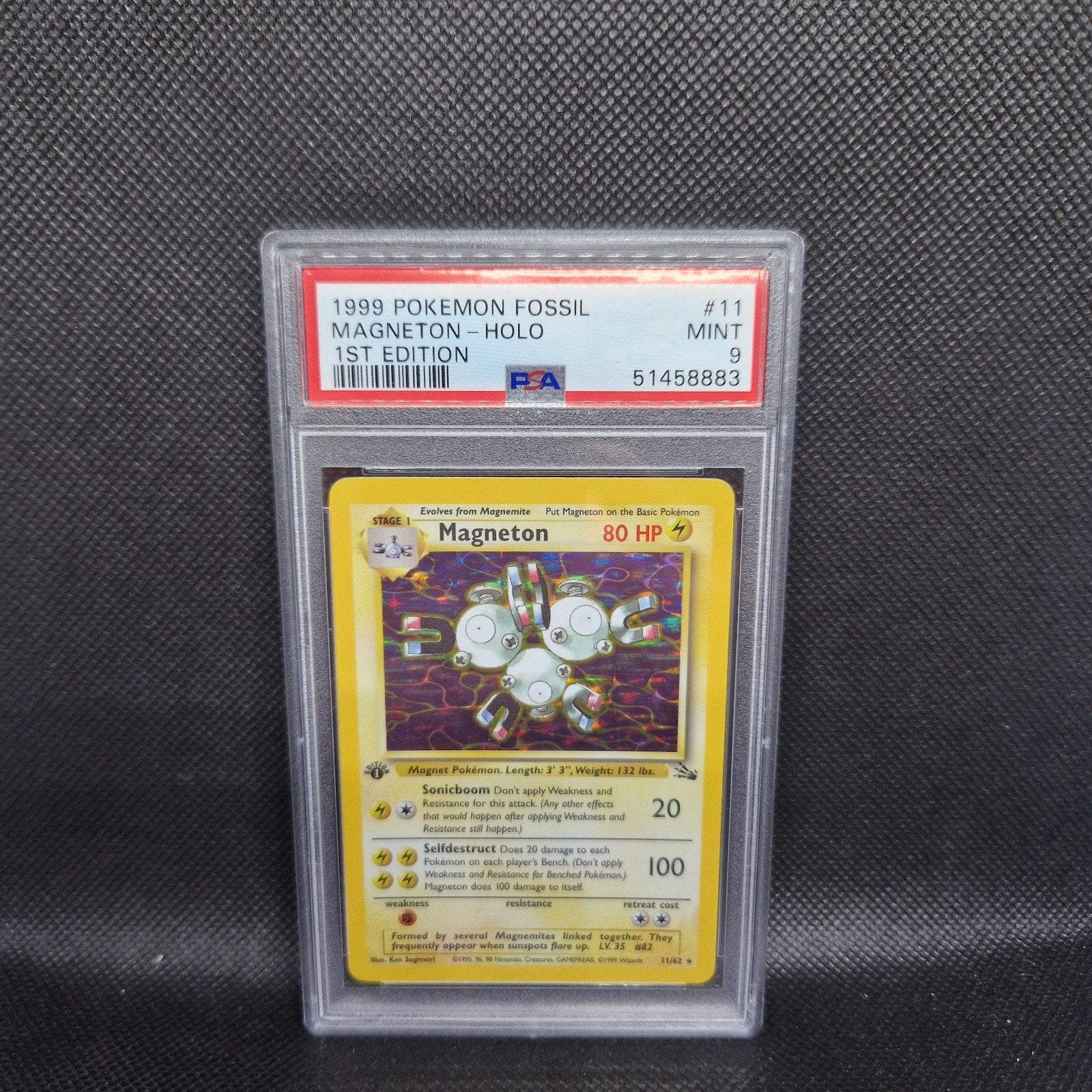 Microwave Holo 1ère édition Fossil PSA 9, Enlèvement ou Envoi