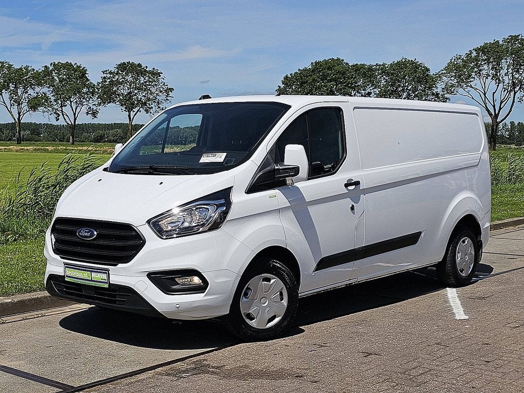 Ford Transit Custom 300 2.0 TDCI L1H2 Trend WF0YXXTTGYPS1370, Auto's, Voorwielaandrijving, Stof, 4 cilinders, Wit