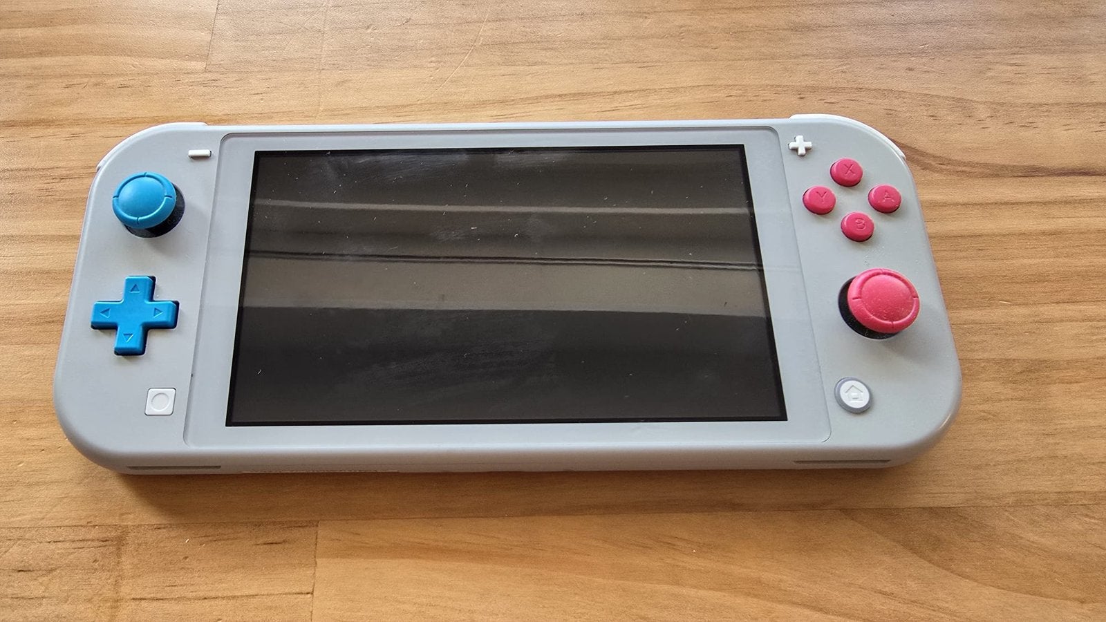Switch light Pokémon + hoesje + SD-kaart, Games en Spelcomputers, Spelcomputers | Overige, Ophalen, Zo goed als nieuw